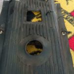 A good original used Porsche pre A tunnel aluminum cover and mat - 1955,Has rips and cracks in the rubber mat .