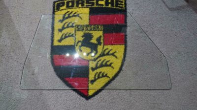 a good used original Door Glass, for Porsche 356 Convertible D or Roadster. With Original Sekurit Markings. In good condition and very use-able . Some light scratches as you would expect from an original item .