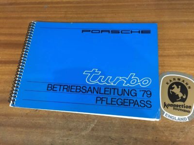 Superb condition Original Porsche 911 Turbo owners handbook dating from 1979. (German Text) has one dog eared corner bottom right and mark near spine, otherwise A1