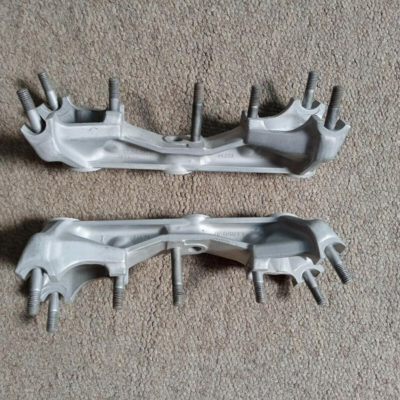 A nice freshly cleaned pair of Porsche 356 B C S90 912 Aluminum Rocker Arm Support Bracket Pair , OE Part number 61610503103. Ready to install. Nice matched pair with part numbers.