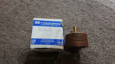 A brand new Porsche 356 thermostat. Opens at 23-24 Degrees Celsius.