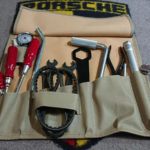 We are offering this nice reproduction tool kit for the Porsche 356A. The tool kit is complete and uses a kk tool bag and very good quality reproduction tools, Spanners and a KK exclusive plug wrench, a KK Hazet 772 wheel wrench. superb reproduction screw drivers , a KK generator wrench, restored pliers, nice original messko and a spark plug. .Includes a conti belt, tyre pressure gauge and . A great affordable tool kit that is ready to use