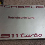 Original Porsche 911 Turbo owners manual , 99 pages printed in German text, dated 9/90 . Superb condition