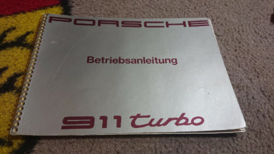 Original Porsche 911 Turbo owners manual , 99 pages printed in German text, dated 9/90 . Superb condition
