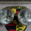 A Pair of Porsche 911/912 Original H1 Headlamps (Pair) LHD with Raised logo, These have new German rims fitted, Very Good condition with Bosch raised logo glass.