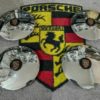 A set of Original Hubcap's With Gold Enameled Crest's for 5X130 Steel Wheels Fits Porsche 356 / 911 1965-89 and 912 models. These have Just been professionally polished , badges have been painted in and touched in by hand . A very usable set of original hub caps .