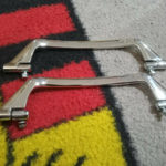 A pair of original re-chromed Porsche 356a 1958-63 inner door pulls curved , They do have the fittings and hardware , these are in good condition and ready to install .These are superb .