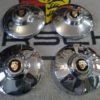 A set of 4 Super Hubcap with Gold Enameled Crest. Fits Porsche 356 Drum Brake Wheels 356A and 356B. These are a mix match set of 2 new and 2 old hub caps , with used and new crests fitted . Some light marks and slight pitting on 2 hubcaps , Please view all pictures .