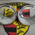 A pair of original Hella USA spec headlights .Original rims and glass retained. These were used on Porsche 356B/C models and appeared in late December 1963 . These are in good condition , they do not have the beam inserts supplied