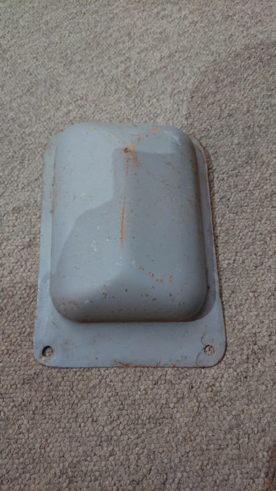 Porsche 356a Fuel pump cover at front of vehicle . The originals had 4 holes and no lip , this can easily be done .