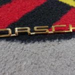 An original Porsche script 356bT6+C 200mm with R on reverse. newly gold plated . This has the R on reverse .