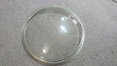 A Single Vw Hella usa spec headlamp lens up to 1967 Volkswagen beetle / bus etc. This is an original part .