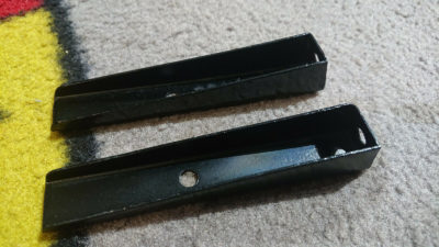 A pair of original Porsche 356a up to 1959 Front number plate mounts , priced per pair .