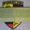 A Genuine Porsche 911 rear center panel 1965-73 . This appears to be NOS , but has had 4 small holes drilled in the number plate area. Please see pictures .