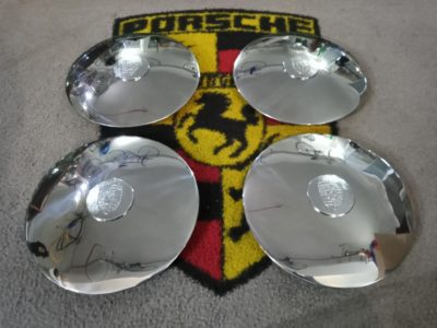 We have this superb restored set of 4, Original flat hubcaps for Porsche 356C, 911, 912. These have been re polished , and have 4 x N.O.S original crests fitted, then cleaned and detailed . The inside are all original and show signs of wear .