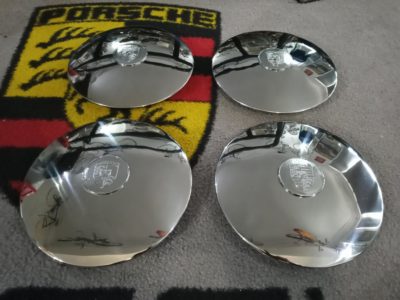 We have this lovely set of 4, Original flat hubcaps for Porsche 356C, 911, 912. These have been re polished , and have 4 x original crests fitted, also re-polished, cleaned and detailed .Stamped Lemmerz and two dates 3/65 +6/65 are present and also 91231 on the inside lip. They have also been detailed and cleaned on the inside . The show signs of wear on the inside as you would expect