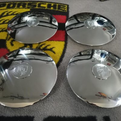 We have this lovely set of 4, Original flat hubcaps for Porsche 356C, 911, 912. These have been re polished , and have 4 x original crests fitted, also re-polished, cleaned and detailed .Stamped Lemmerz and two dates 3/65 +6/65 are present and also 91231 on the inside lip. They have also been detailed and cleaned on the inside . The show signs of wear on the inside as you would expect