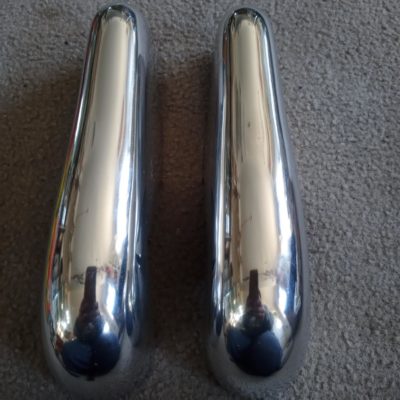 A pair of Porsche 356PRE A & 356A early 64mm wide pair of bumper guards polished brand new , These are a pair for front or rear of the vehicle . These have been in storage and never used , in perfect condition .