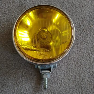 Hella yellow spot light in perfect condition 120mm Glass , Made in Germany. 1-105275. The glass and chrome are in perfect condition , ready to install .