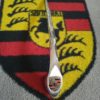 superb all original Porsche 356A hood handle Late 1955-60 models .This has been stripped , re-polished and and original flat style badge re-installed , some enamel missing on badge , but really shows great age and patina .