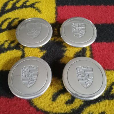 A nice set of 4 , Fuch's 3 prong centre caps early style , with 66mm fitment , these have been stripped , re-polished and detailed . Ready to install .