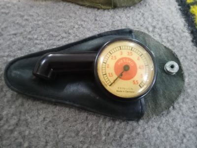 Original Messko tyre pressure gauge bakerlite red dot . 1.0-5.5 bar Porsche/VW . Supplied with the original pouch in Black, press stud has become detached from the main material . It is included and can be put back on, Overall the pouch in great condition . Made in Germany By Hauser .