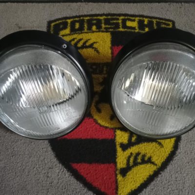 A pair of used original headlights H4