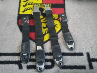 A pair of Rear Repa seat belts used for Porsche 911 LWB . These are dated 1969 and still have the silk label attached . The outer covers are a little tatty , but very usable .