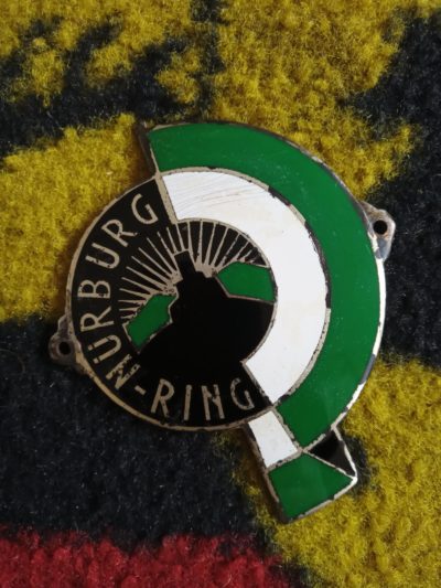 An original vintage Nürburgring grill or side badge