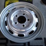 A freshly stripped, blasted and lightly powder coated original Lemmerz 4.5Jx15 steel wheel dated 5/64.