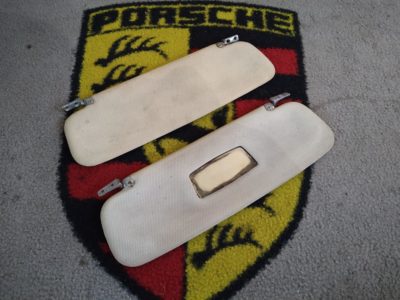 A pair of survivor sun visors for a Porsche 356 A/ T2 & BT5 , original vanity mirror and pivot mounts , no rips superb patina .