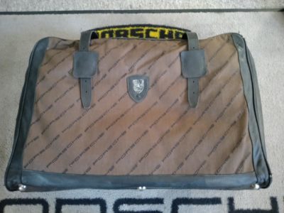 1 x Vintage SEEGER Porsche leather/cloth luggage case . This is in good used condition , it shows signs of wear on the badge , handle etc . We can see no rips or damage . Lining is in good condition .