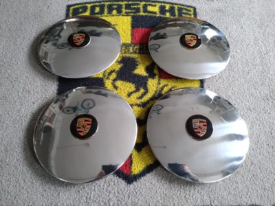 A set of Original Hubcap’s With Gold Enamelled Crest’s for 5X130 Steel Wheels Fits Porsche 356 / 911 1965-89 and 912 models. These have Just been professionally polished , badges have been painted in and touched in by hand . A very usable set of original hub caps .