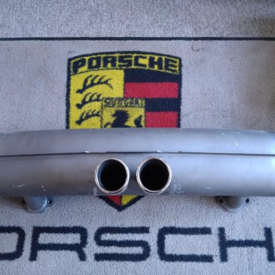 A Rear exhaust box, double 76mm polished stainless steel tail pipes, manufactured by Dansk .